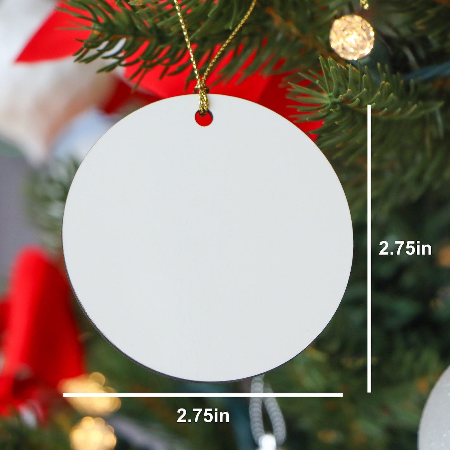 White round ornament with gold chain on a Christmas tree, showing measurements.