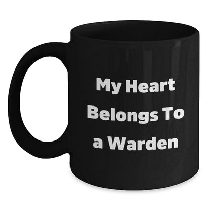 Funny Warden Gifts from Friends and Family, Black Coffee Mug with Quote 'My Heart Belongs To A Warden' for Warden Lovers, Christmas Unique Gifts - Main