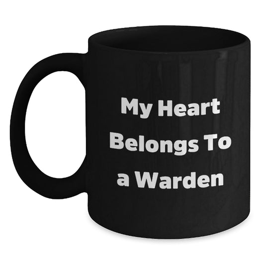 Funny Warden Gifts from Friends and Family, Black Coffee Mug with Quote 'My Heart Belongs To A Warden' for Warden Lovers, Christmas Unique Gifts - Main