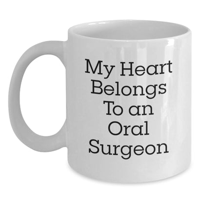 Funny Oral Surgeon Gifts from Friends, White Coffee Mug for Christmas Unique Presents, My Heart Belongs To An Oral Surgeon Lover - Main