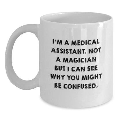 Funny Medical Assistant Christmas Unique Gifts for Friends and Family from Men, White Ceramic Coffee Mugs, Not a Magician But See Why You Might be Confused Mug - Main