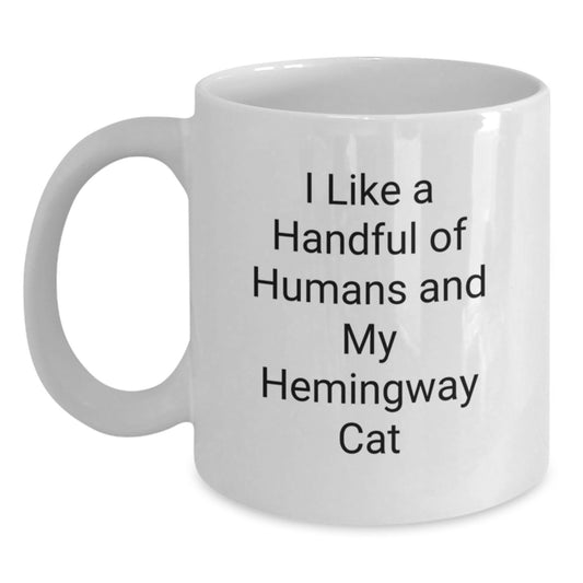 Hemingway Cat Lover Gifts from Friends, Unique White Coffee Mug for Men, Women, or Family, Funny Quote I Like A Handful Of Humans And My Hemingway Cat, Christmas Unique Gifts - Main