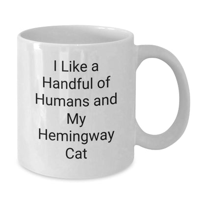 Hemingway Cat Lover Gifts from Friends, Unique White Coffee Mug for Men, Women, or Family, Funny Quote I Like A Handful Of Humans And My Hemingway Cat, Christmas Unique Gifts - Additional
