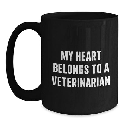 Funny Veterinarian Quotes Gifts for Her or Him, Black Coffee Mug by Friends or Family for Birthday, 'My Heart Belongs To A Veterinarian' - Main
