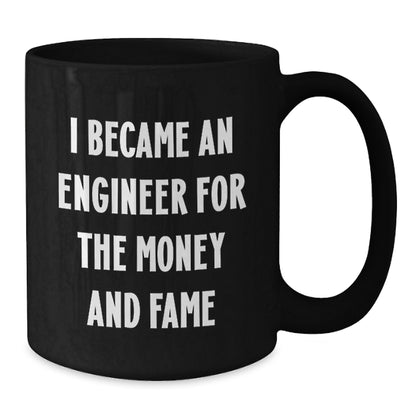 Funny Engineer Gifts for Men, Women, or Coworkers - 'I Became An Engineer For The Money And Fame' Christmas Unique Black Coffee Mug - Gifts from Friends, Family or Yourself - Additional