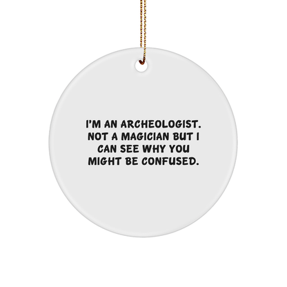 Archeologist Gifts from Friends - Funny Circle Ornament for Christmas, 'I'm An Archeologist. Not A Magician...' - Victory Thru Vision 