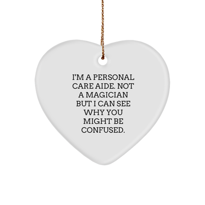 Funny Personal Care Aide Gifts, I'm A Personal Care Aide. Not A Magician, Heart Ornament for Christmas, Gifts from Family to Personal Care Aide - Victory Thru Vision 