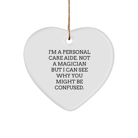 Funny Personal Care Aide Gifts, I'm A Personal Care Aide. Not A Magician, Heart Ornament for Christmas, Gifts from Family to Personal Care Aide - Victory Thru Vision 