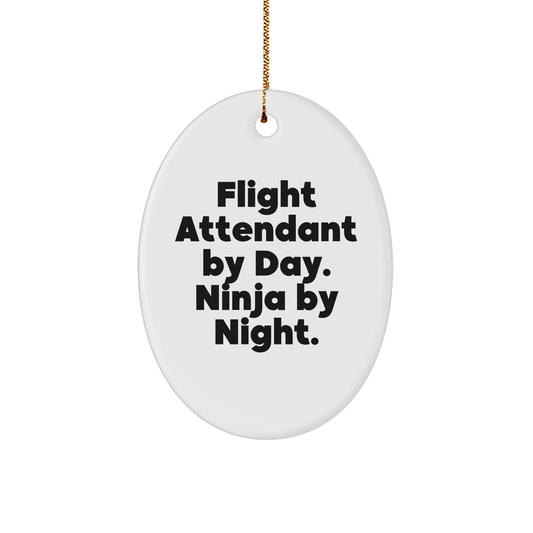 Flight Attendant Gifts from Friends to Flight Attendants, Oval Ornament for Christmas, 'Flight Attendant By Day. Ninja By Night.' Quote, White Oval Ornament for Men or Women - Image 1