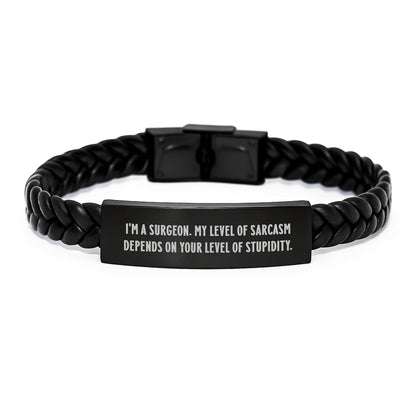 Funny Surgeon Gifts from Family - 'I'm A Surgeon. My Level Of Sarcasm Depends On Your Level Of Stupidity.' Interlaced Leather Bracelet for Surgeon Friends - Unique Christmas Unique Gifts for Men - Image 1