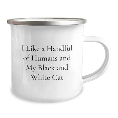 Funky Black and White Cat Gifts from Friends to Family, Black and White Cat Lovers Camping Mug for Graduation, I Like A Handful Of Humans And My Black And White Cat - Funny Quote - Victory Thru Vision