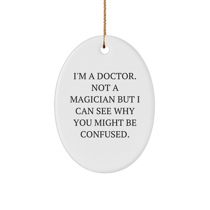 Funny Doctor Gifts from Friends - 'I'm A Doctor. Not A Magician But I Can See Why You Might Be Confused.' Oval Ornament for Christmas - Victory Thru Vision 