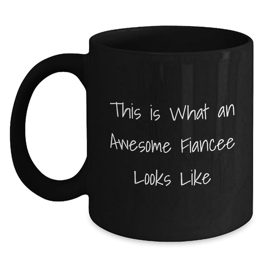Funny Fiancee Gifts from Men to Women - This Is What An Awesome Fiancee Looks Like Black Coffee Mug for Graduation, Unique Gifts for Fiancee - Victory Thru Vision