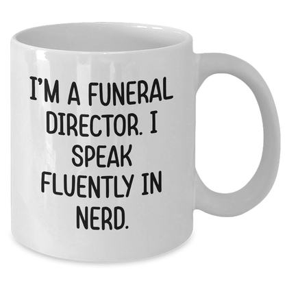 Funny Funeral Director Gifts for Men - 'I'm A Funeral Director. I Speak Fluently In genius.' White Coffee Mug, Gifts from Friends to Funeral Director - Victory Thru Vision