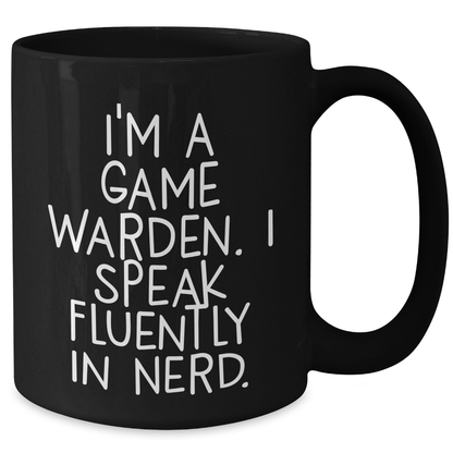 Funny Game Warden Gifts, 'I'm A Game Warden. I Speak Fluently In genius.' Black Coffee Mug, Graduation Unique Gifts from Friends, Coworkers, or Family to Game Wardens - Victory Thru Vision
