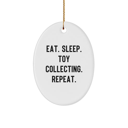 Funny Toy Collecting Gift for Friends - Eat. Sleep. Toy Collecting. Repeat. Oval Ornament, White, 3.25" Tall, Perfect for Christmas Unique Gifts from Family, Friends and Coworkers - Victory Thru Vision