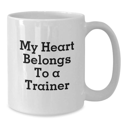 Funny Trainer Gifts from Family, Unique White Coffee Mug for Trainer Lover on Graduation, 'My Heart Belongs To A Trainer' Quote, White Ceramic Mug, Microwave and Dishwasher Safe - Victory Thru Vision