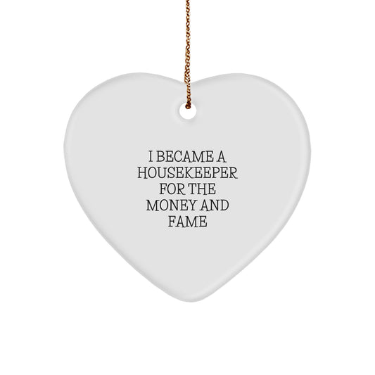 Funny Housekeeper Gifts for Christmas - Heart Ornament for Housekeeper Lover - 'I Became A Housekeeper For The Money And Fame' Housekeeper Heart Ornament - Image 1