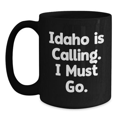 Idaho Calling Funny Gifts from Friends for Graduation Unique Black Coffee Mug - Victory Thru Vision