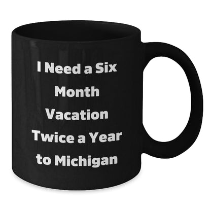 Michigan Gifts for Graduation - Black Coffee Mug with Funny Quote 'I Need A Six Month Vacation Twice A Year To Michigan' from Friends, Family or Coworkers, Perfect for Michigan Lovers - Victory Thru Vision