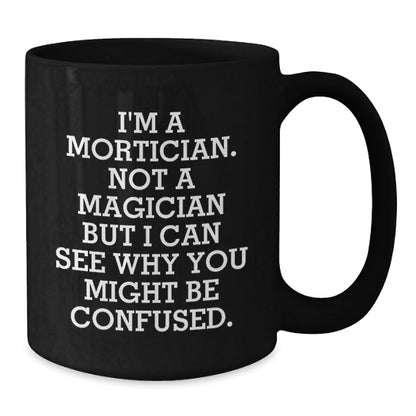 Mortician Gifts from Men - Funny Black Coffee Mug, 'I'm A Mortician. Not A Magician', Birthday Unique Gifts for Mortician - Victory Thru Vision