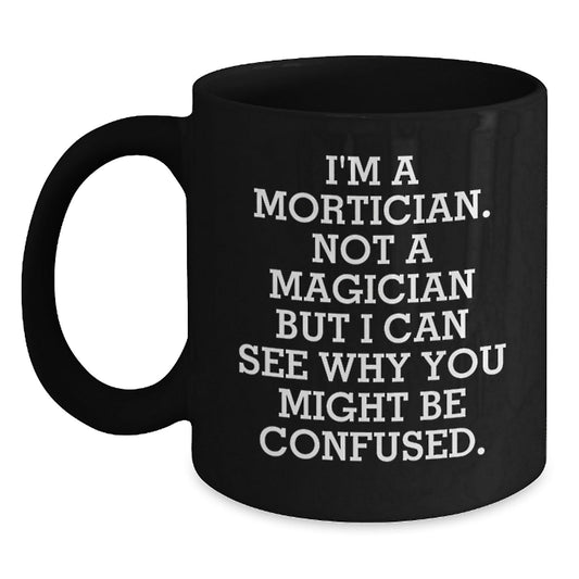 Mortician Gifts from Men - Funny Black Coffee Mug, 'I'm A Mortician. Not A Magician', Birthday Unique Gifts for Mortician - Victory Thru Vision