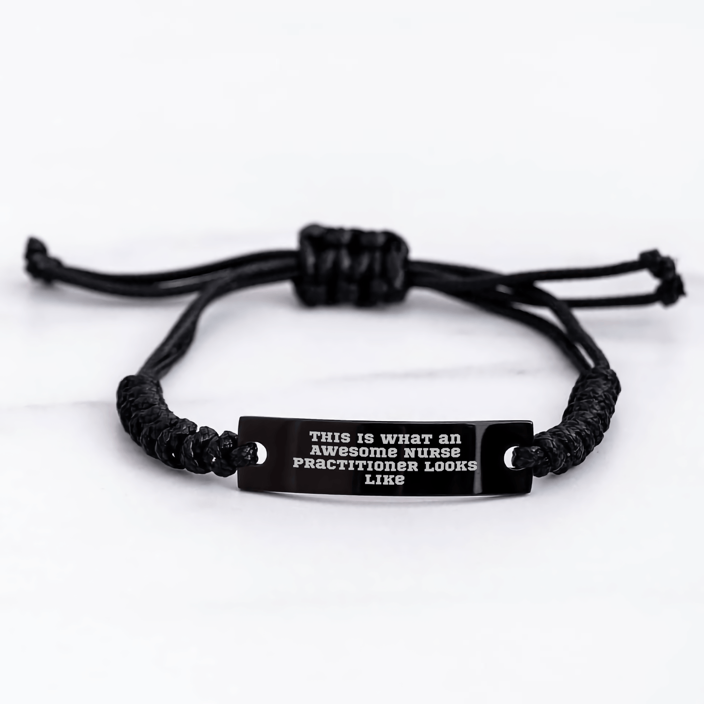 Nurse Practitioner Gifts from Friends, Inspirational Rope Bracelet for Graduation, 'This Is What An Awesome Nurse Practitioner Looks Like' Quote, Adjustable Black Stainless Steel and Interlaced Rope - Victory Thru Vision