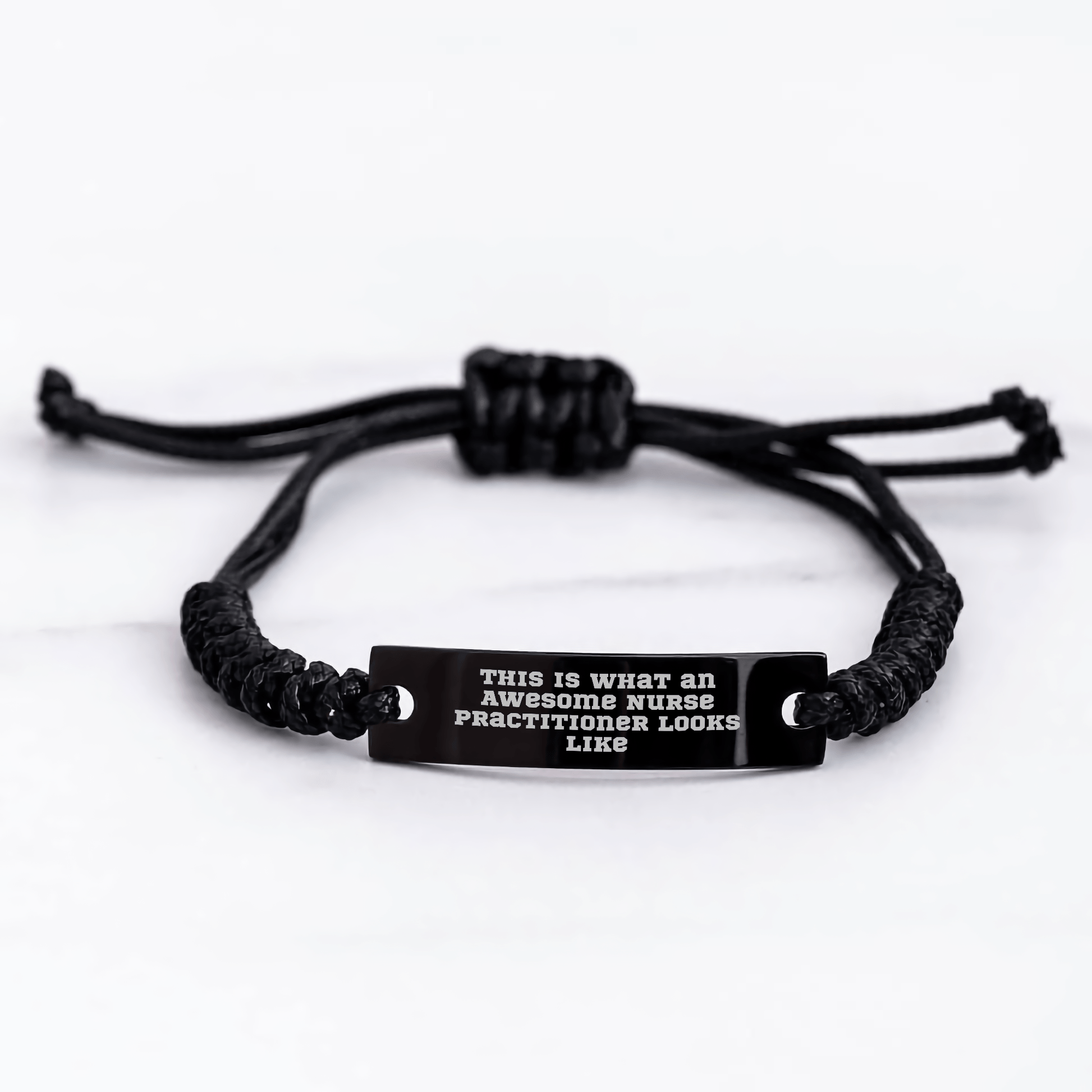 Nurse Practitioner Gifts from Friends, Inspirational Rope Bracelet for Graduation, 'This Is What An Awesome Nurse Practitioner Looks Like' Quote, Adjustable Black Stainless Steel and Interlaced Rope - Victory Thru Vision