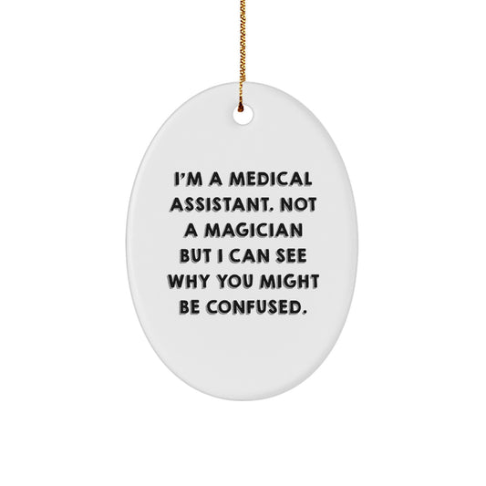 Funny Medical Assistant Gifts from Friends, Oval Ornament for Christmas Unique Ideas, I'm A Medical Assistant Not A Magician But I Can See Why You Might Be Confused - Image 1