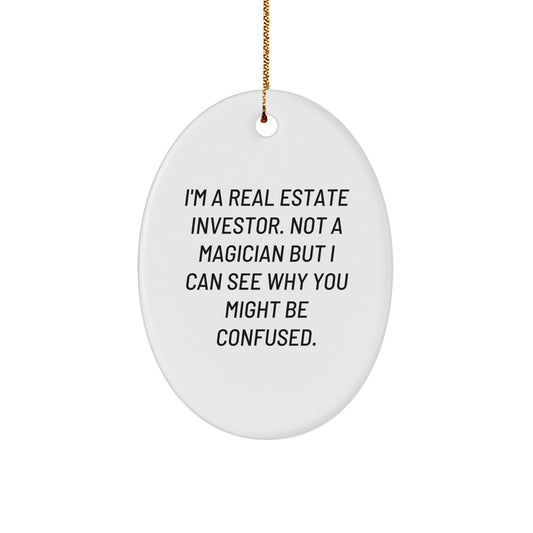 Gifts from Family Members, Christmas Unique Gifts for Real Estate Investors, Oval Ornament with Humorous Quote: 'I'm A Real Estate Investor. Not A Magician But I Can See Why You Might Be Confused.' - Image 1