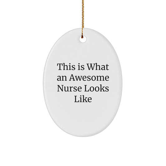 Nurse Gifts for Christmas: 'This Is What An Awesome Nurse Looks Like' Oval Ornament from Friends and Family - Image 1