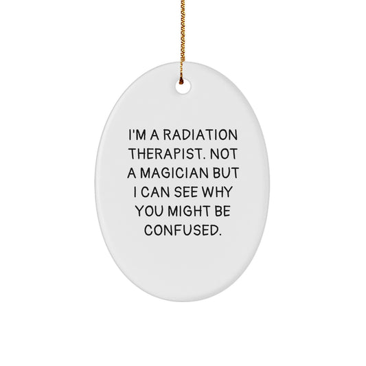 Funny Radiation Therapist Gifts from Friends, Unique Oval Ornament for Men and Women - A Radiation Therapist Not A Magician But I Can See Why You Might Be Confused at Christmas - Image 1
