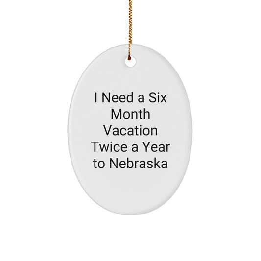 Funny Nebraska Christmas Unique Gift Ideas for Men or Women - Oval Ornament I Need A Six Month Vacation Twice A Year To Nebraska - Image 1