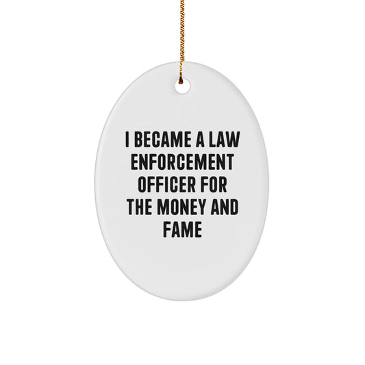 Funny 'I Became A Law Enforcement Officer For The Money And Fame' Law Enforcement Officer Gifts from Friends - Oval Ornament for Men - Christmas Unique Gifts for Law Enforcement Officer - Image 1
