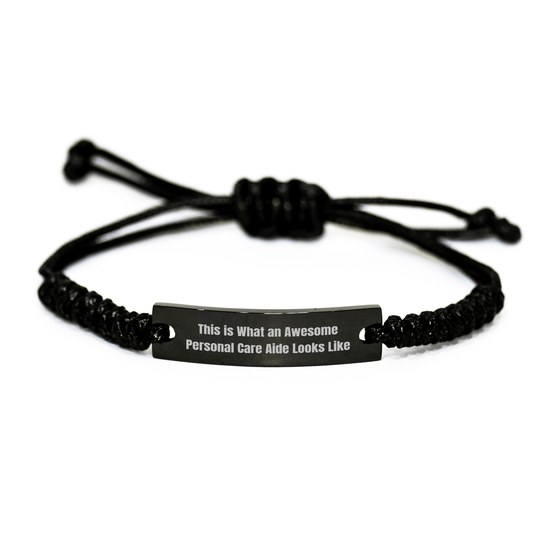 Personal Care Aide Gifts from Friends, Family, Coworkers - Inspirational Rope Bracelet for Graduation, 'This Is What An Awesome Personal Care Aide Looks Like' Quote, Adjustable Black Rope - Victory Thru Vision 